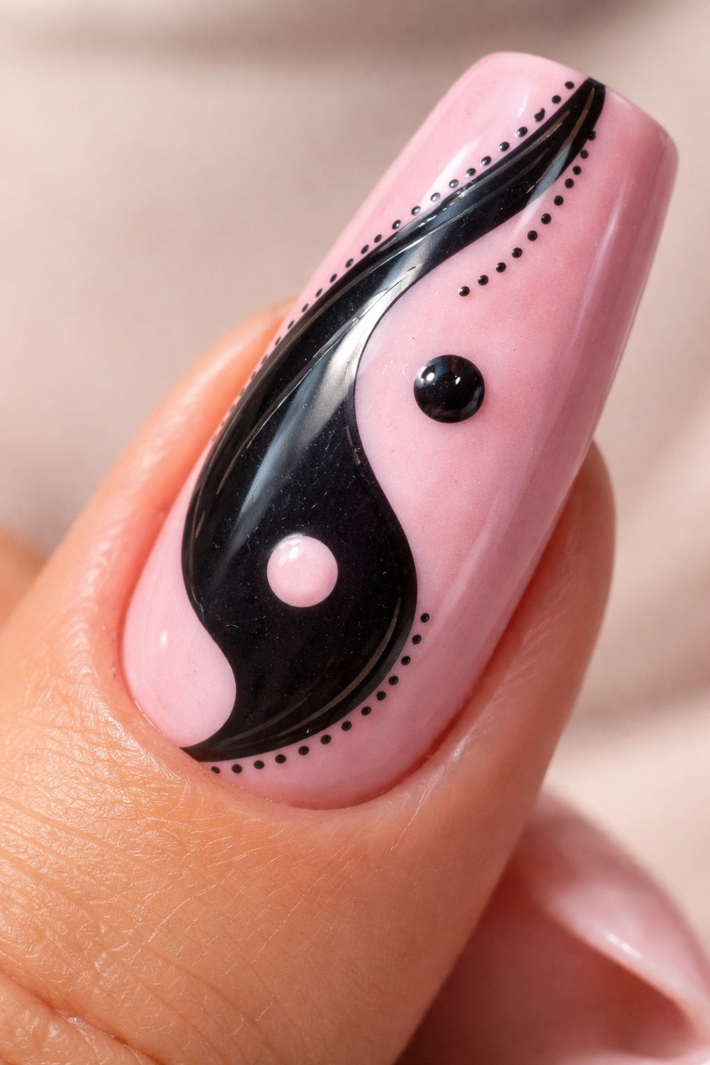 Duck nail with yin-yang design in pink and black