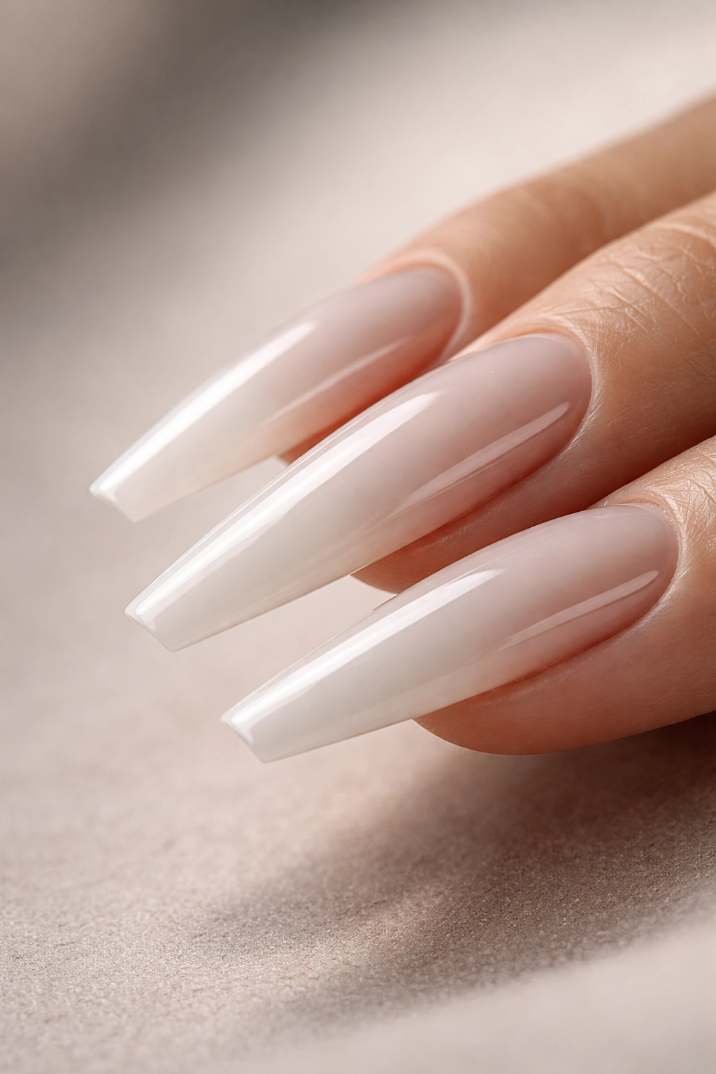 Profile close-up of long coffin nails highlighting apex and sidewalls