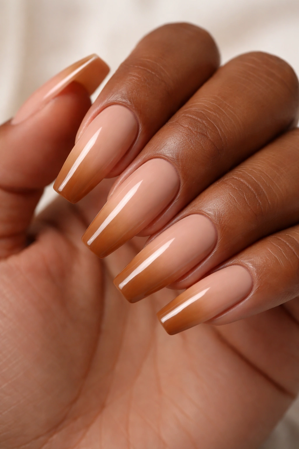 Coffin nails beige to caramel ombre with soft transition