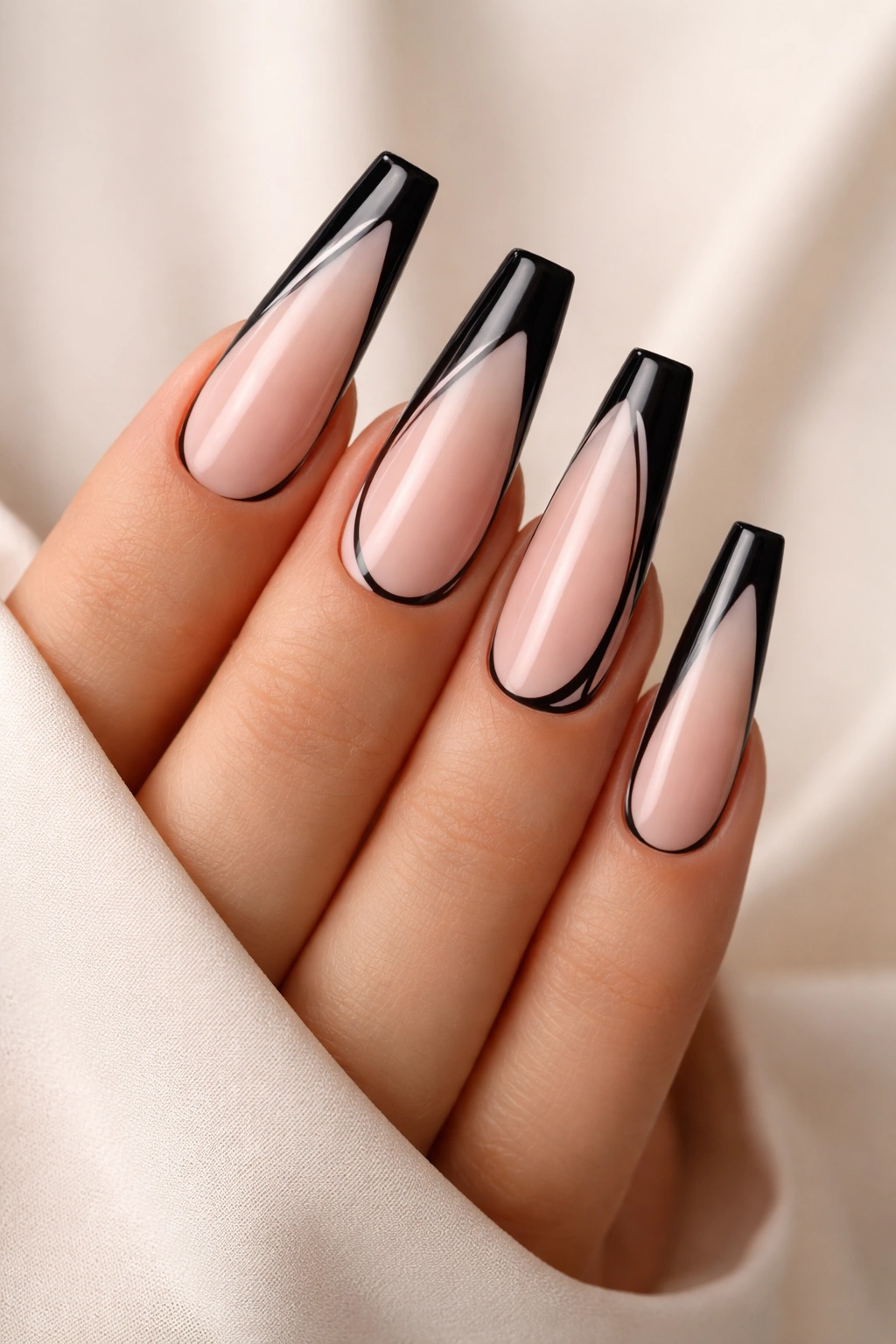 Black and blush coffin nails with minimal line art
