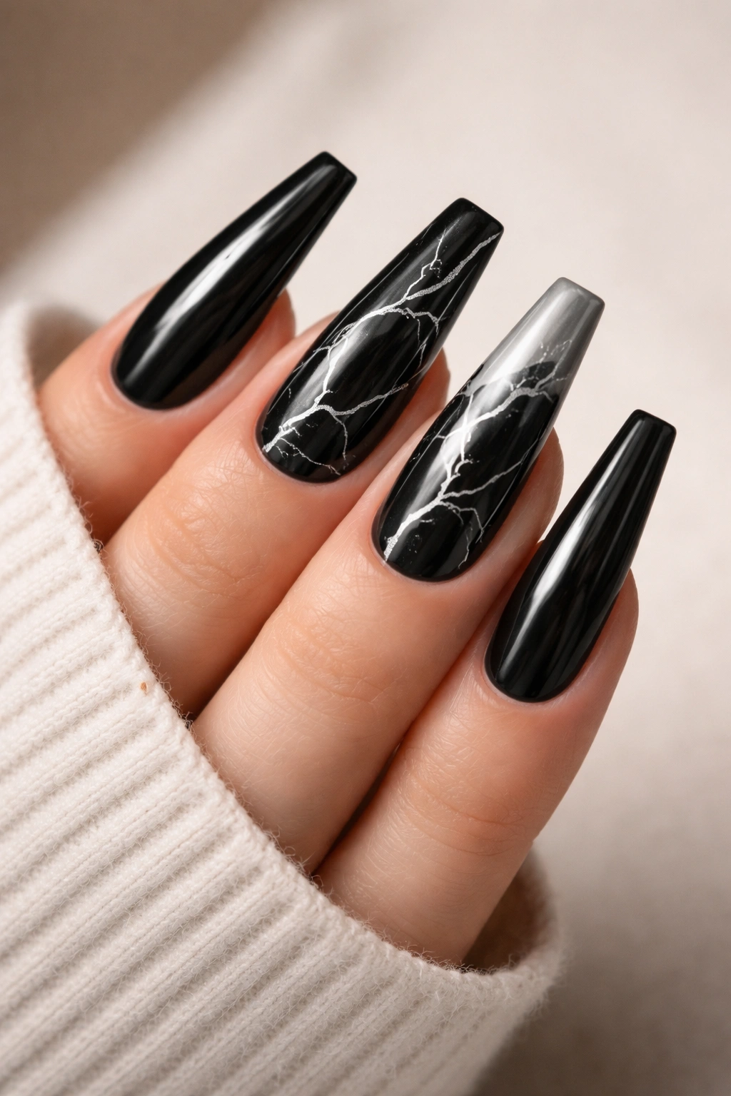 Black marble coffin nails with fine silver veining on several nails