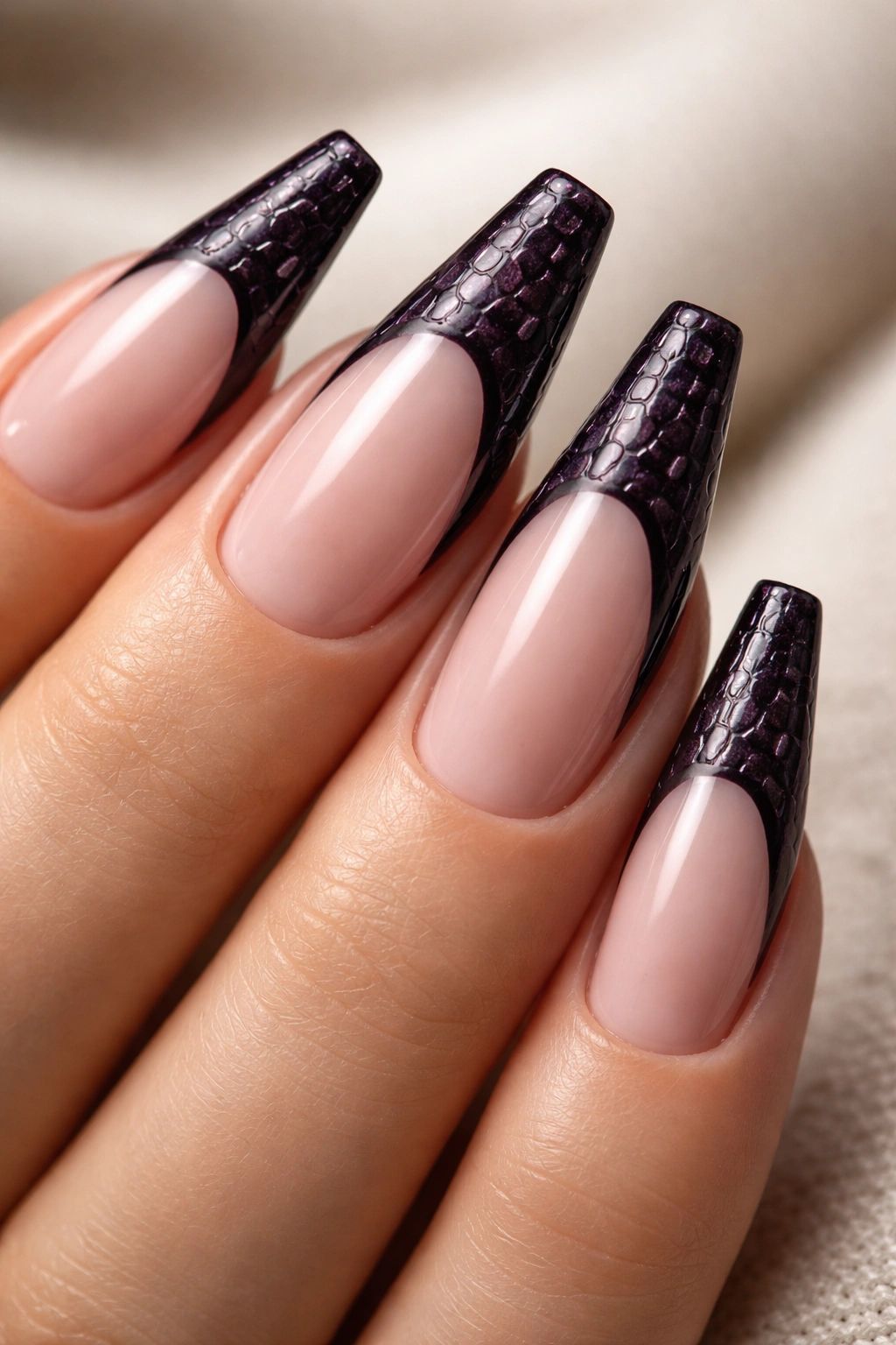 Close-up of Blackened Purple Croc-Texture Tips on ballerina nails with raised pattern