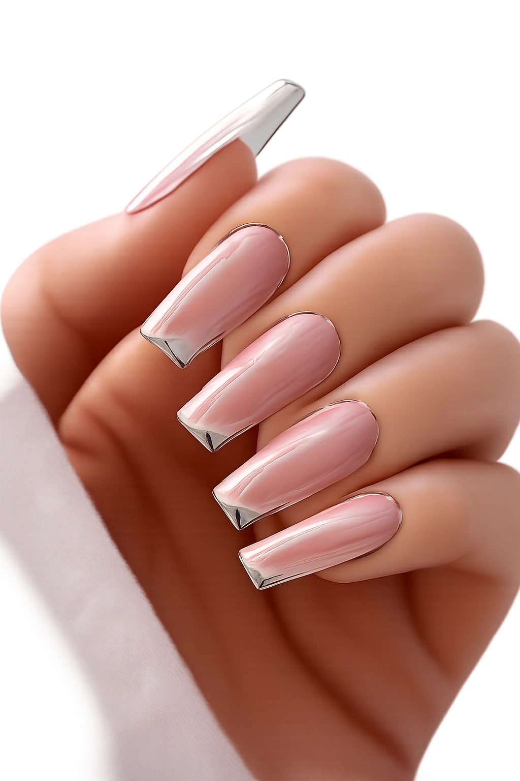Close-up of clear coffin nails with silver chrome sidewall outlines on a hand, showing architectural nail framing