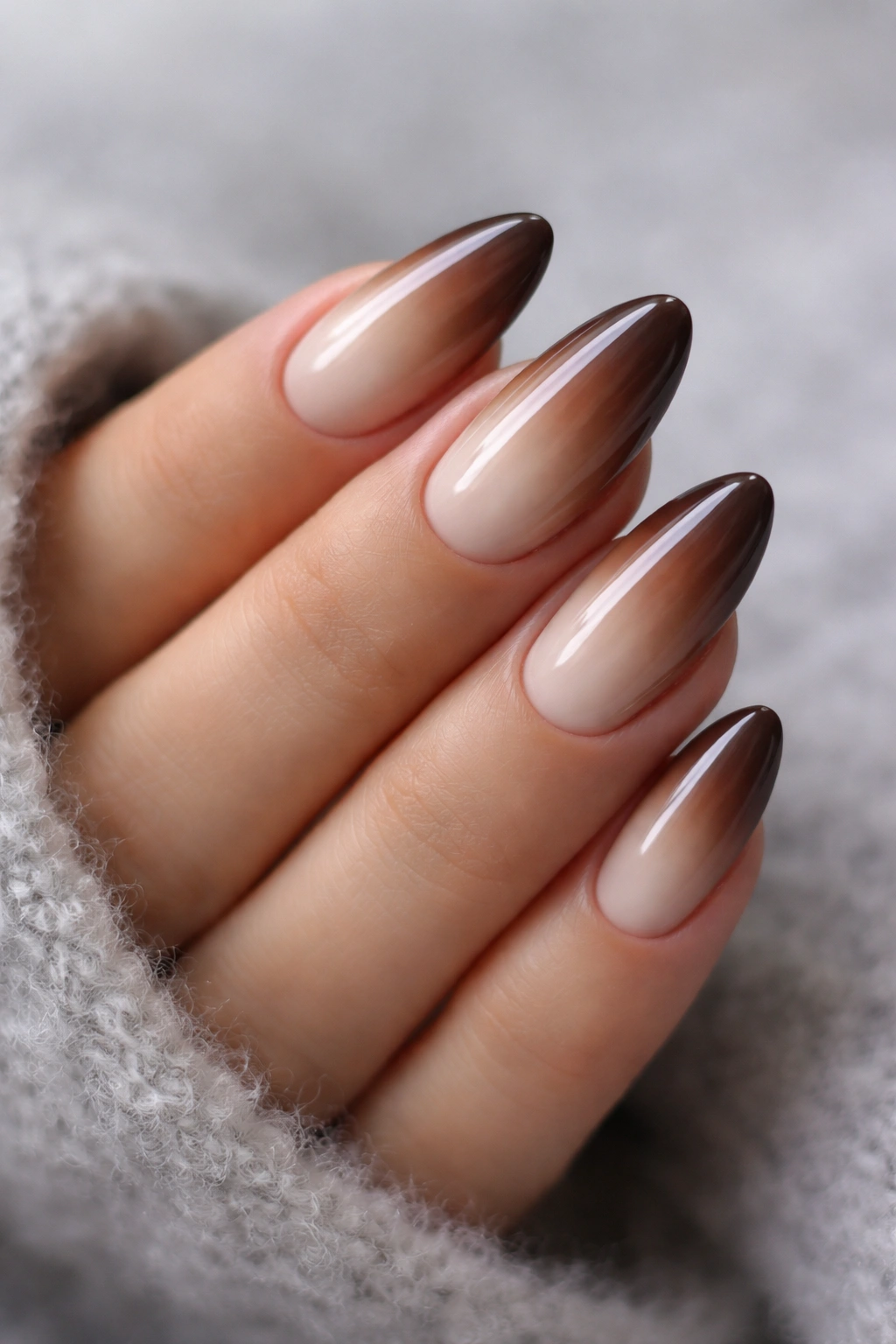 Almond nails gradient from espresso to ivory in a cocoa-to-cream ombré