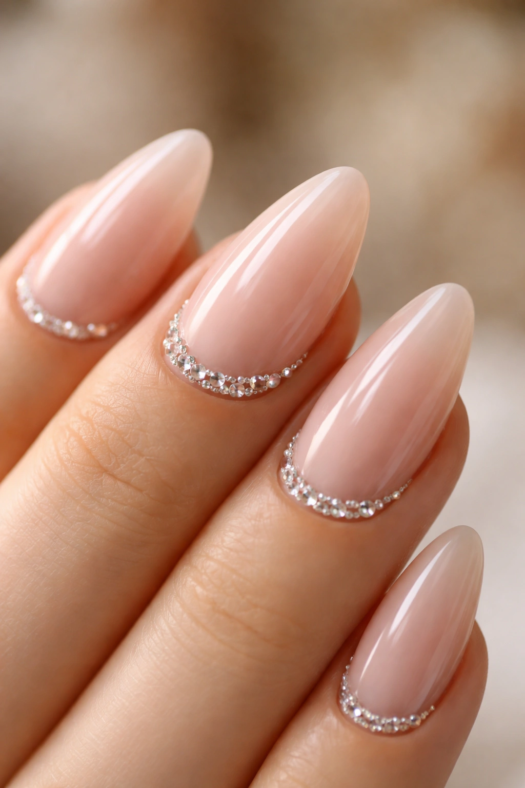 Almond nails with crystal cuticle line along the base