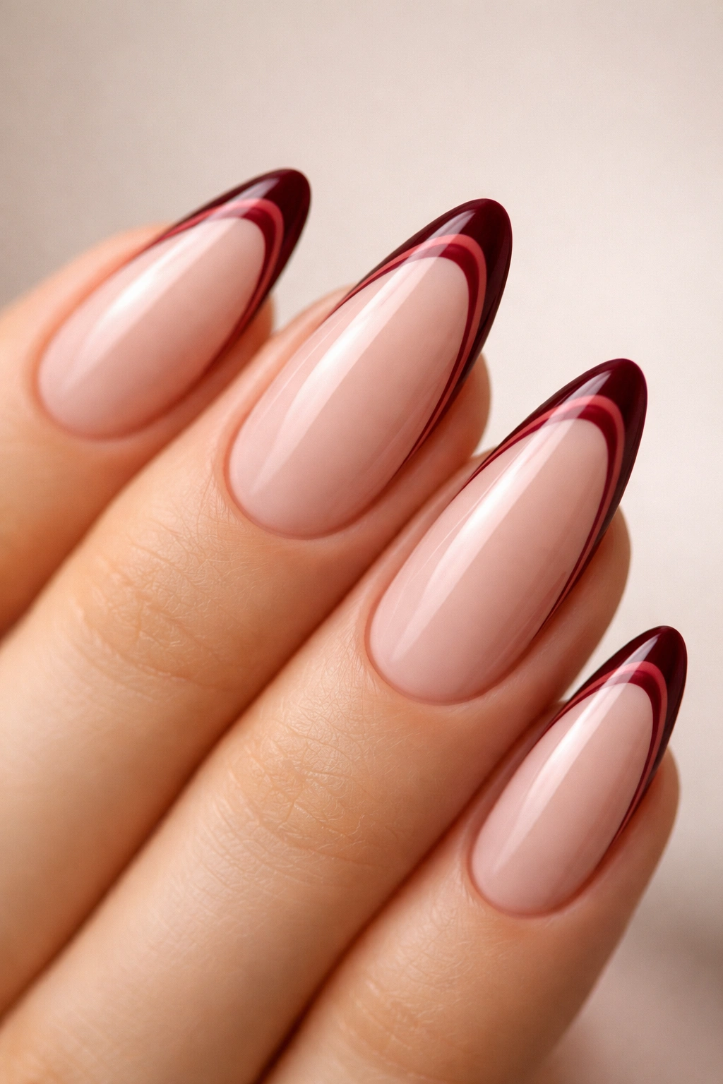 Almond nails with dark cherry double French tips