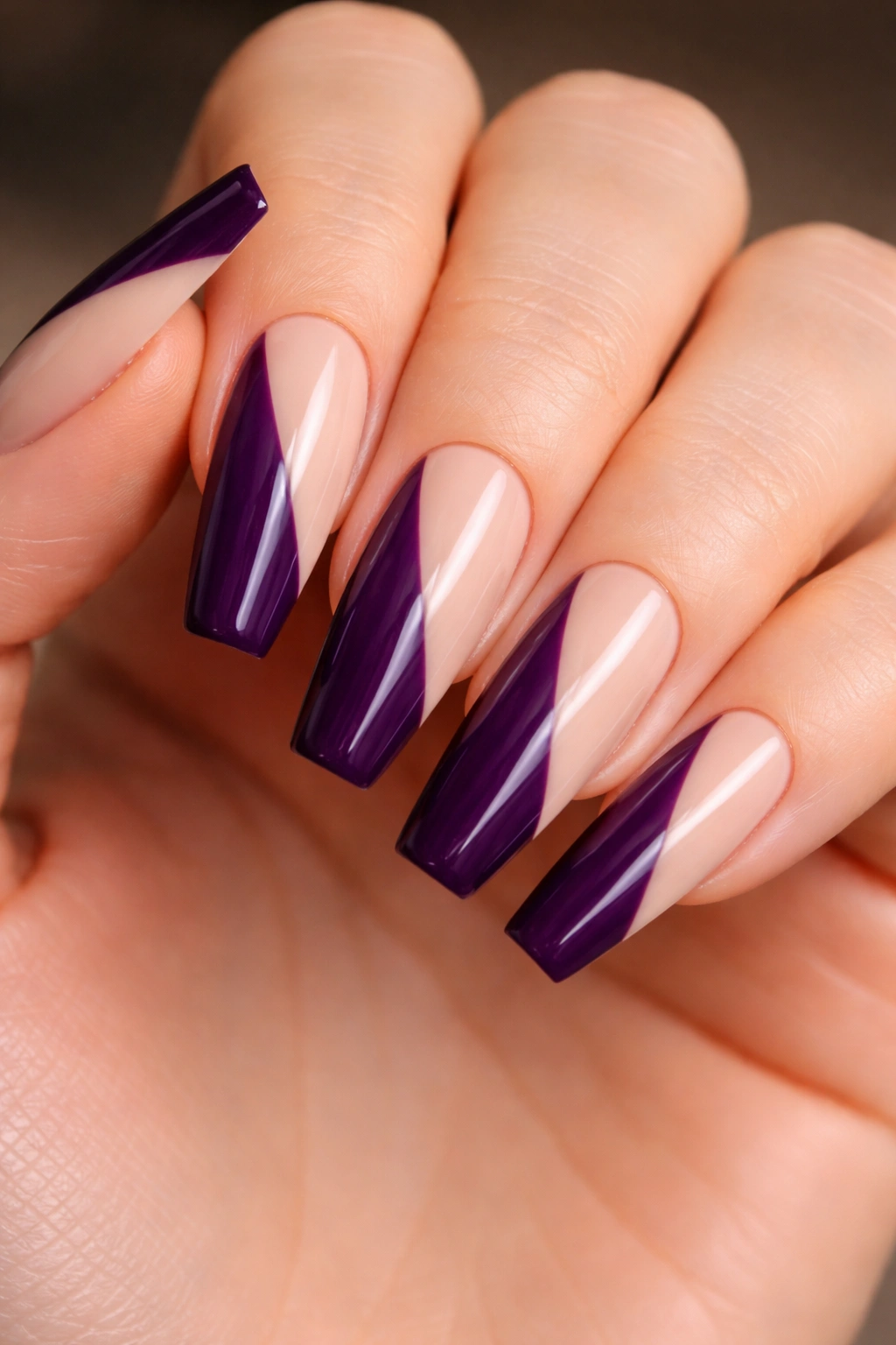 Deep purple and nude diagonal color-block on ballerina nails
