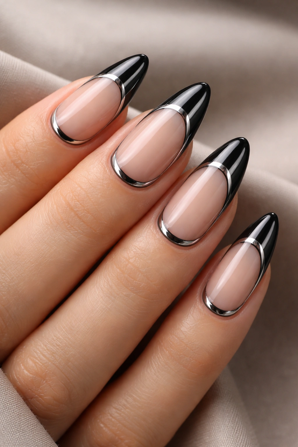 Almond nails with double French black chrome lines at cuticle and tip