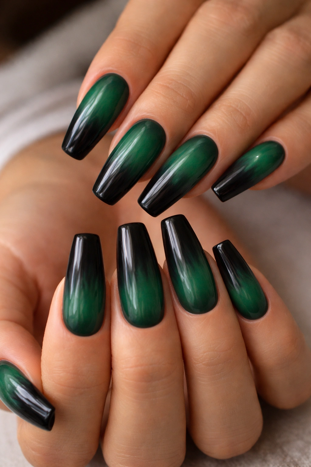 Emerald to black ombré coffin nails with smoky fade
