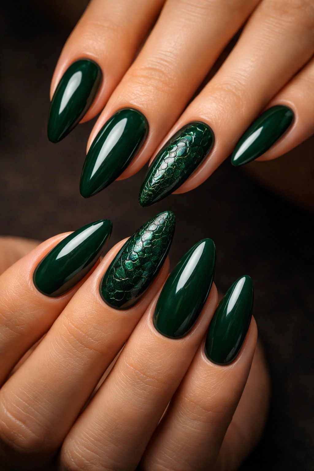 Almond nails with reptile texture on emerald base