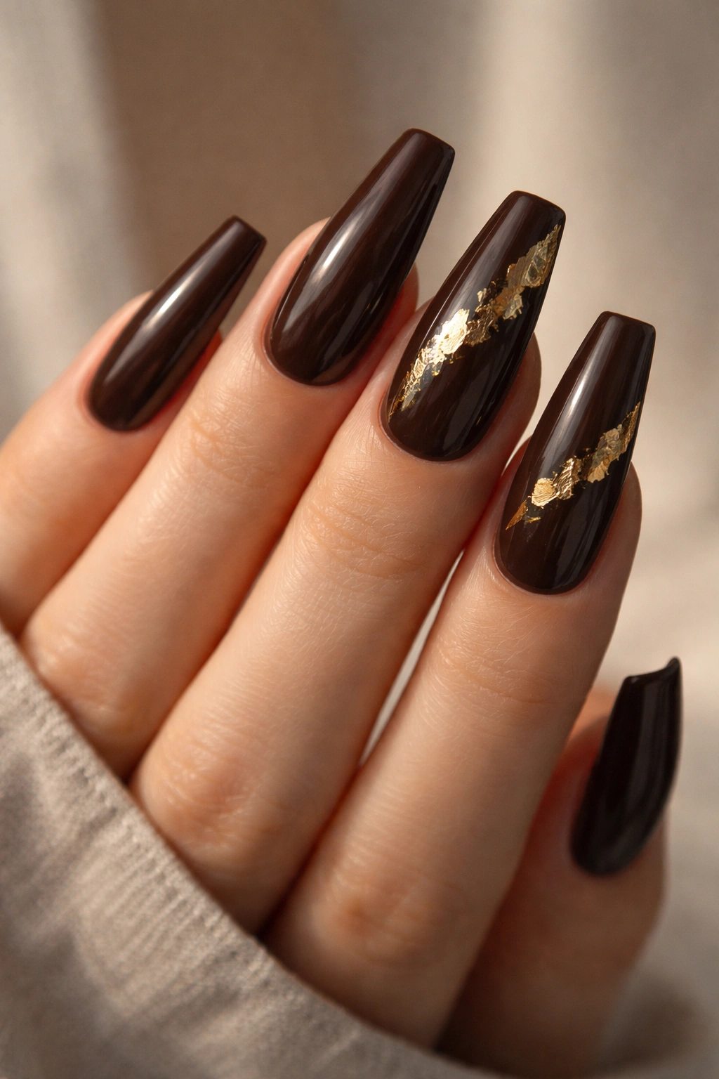 Espresso brown coffin nails with torn gold foil accents