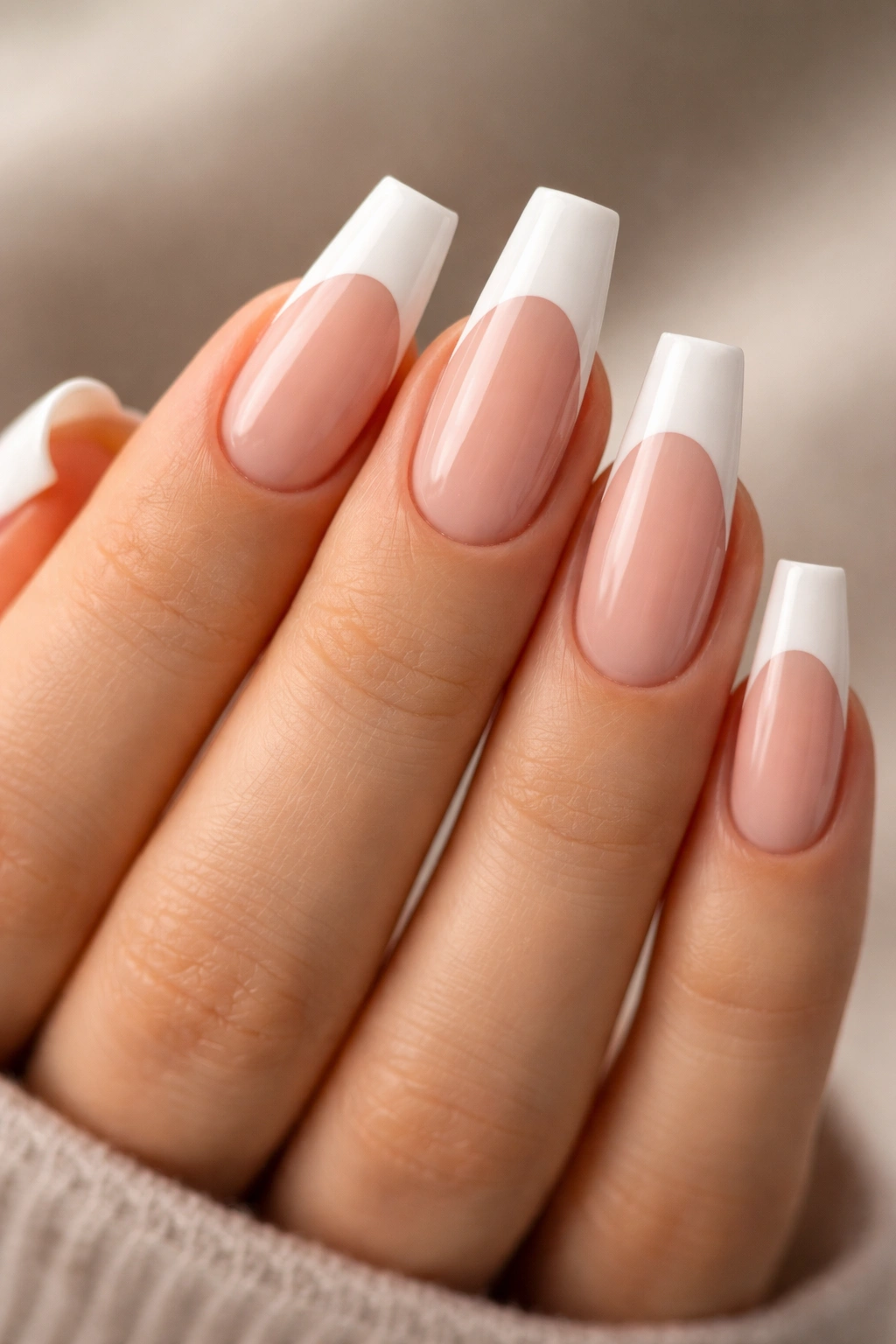 Crisp French coffin nails with deep smile line close-up