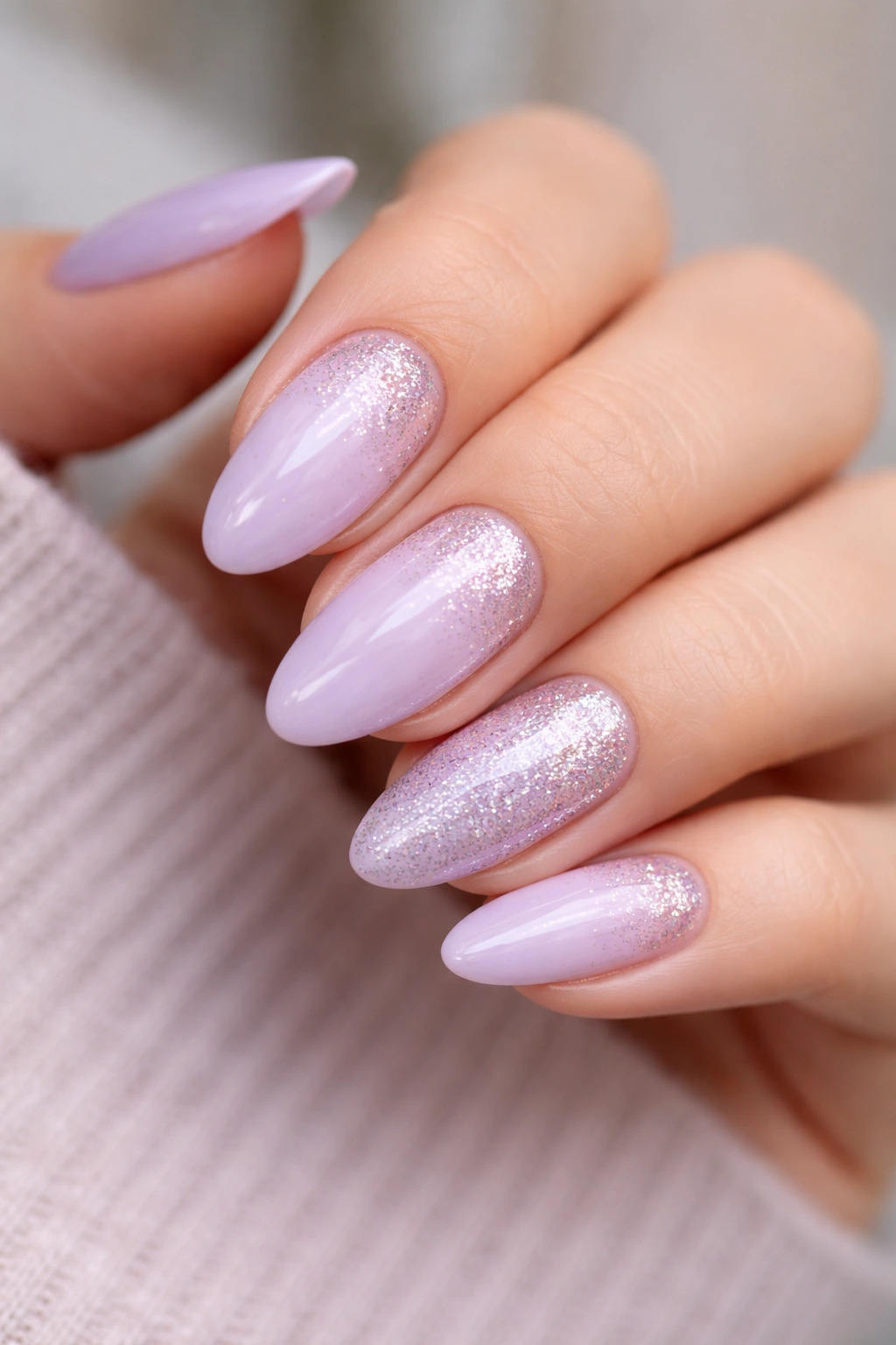 Lilac nails with glitter fade on almond shape