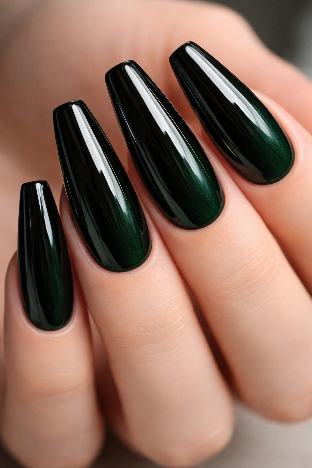 Glossy emerald-black green coffin nails with high shine