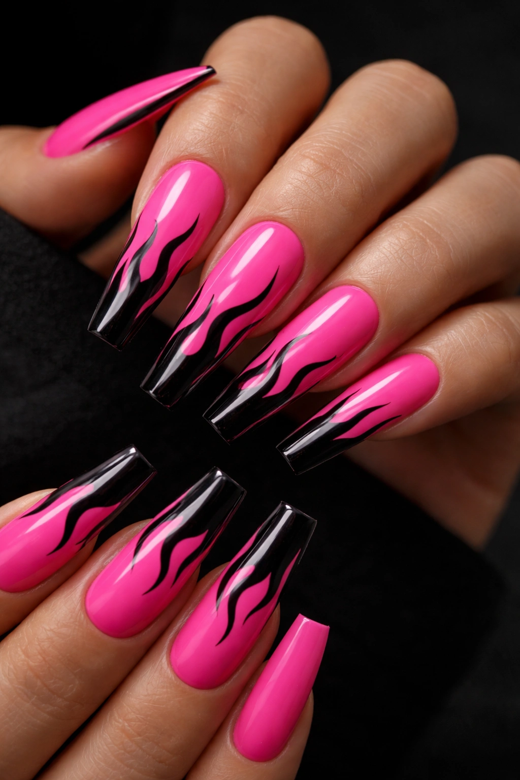Hot pink and black flame coffin nails with minimal negative space