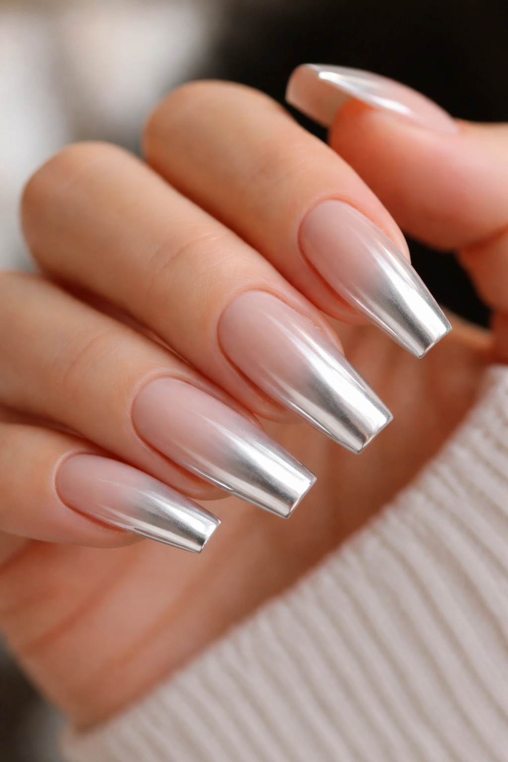 Icy ombre silver chrome coffin nails transitioning from nude to tip