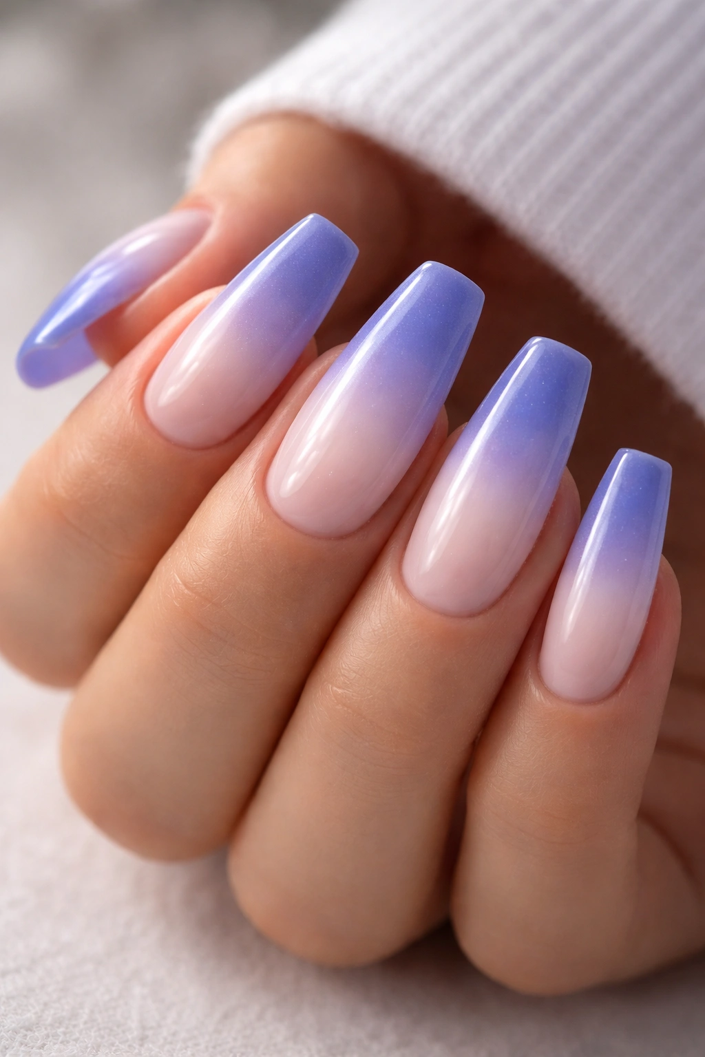 Coffin nails with indigo aura fade and soft center glow