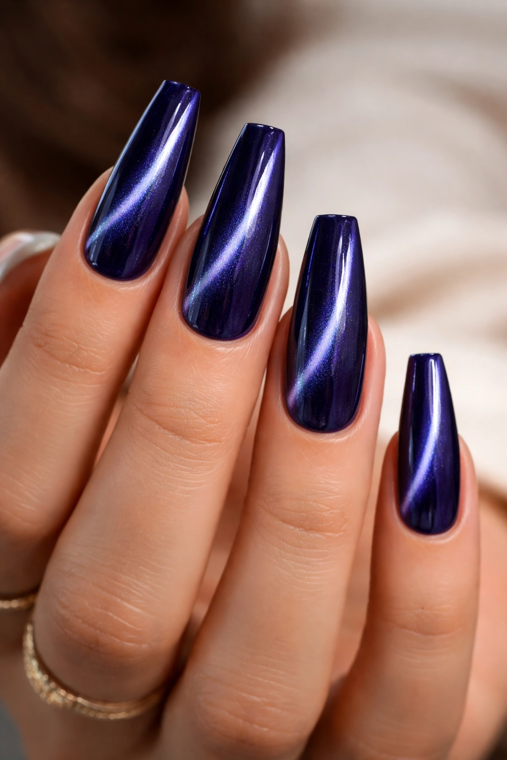 Indigo velvet cat-eye coffin nails with magnetic glow line