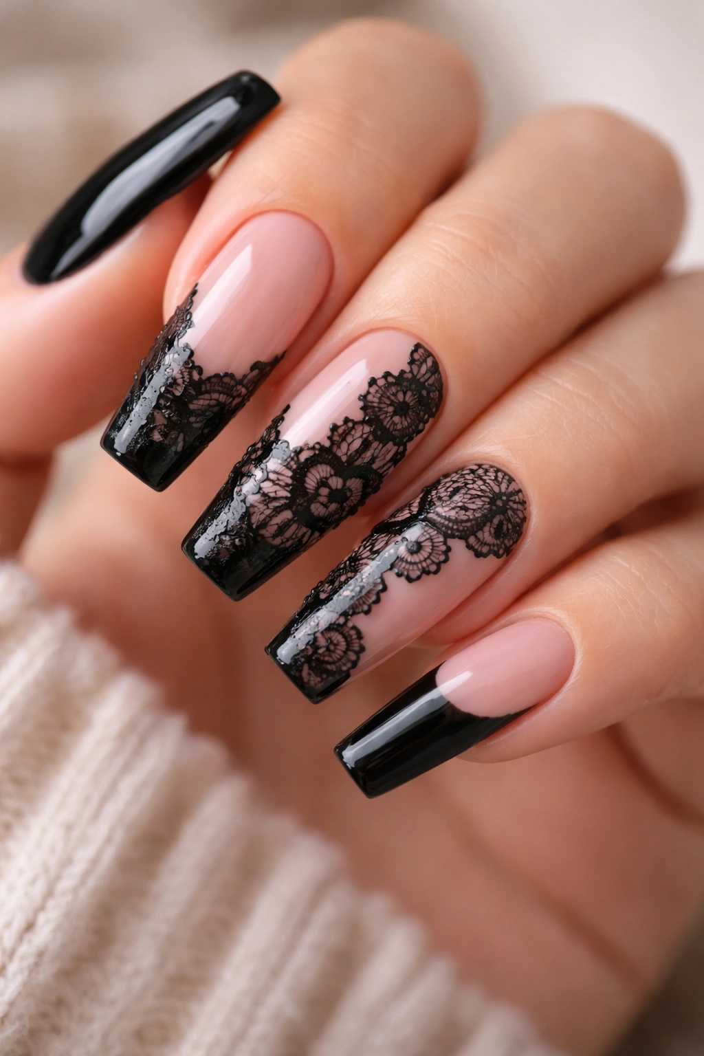 Nude pink coffin nails with black lace art
