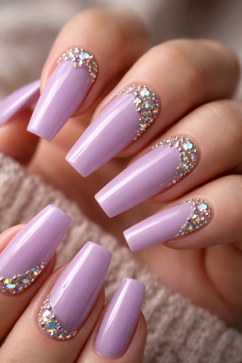 Lavender coffin nails with aurora borealis rhinestones on a glossy lavender base