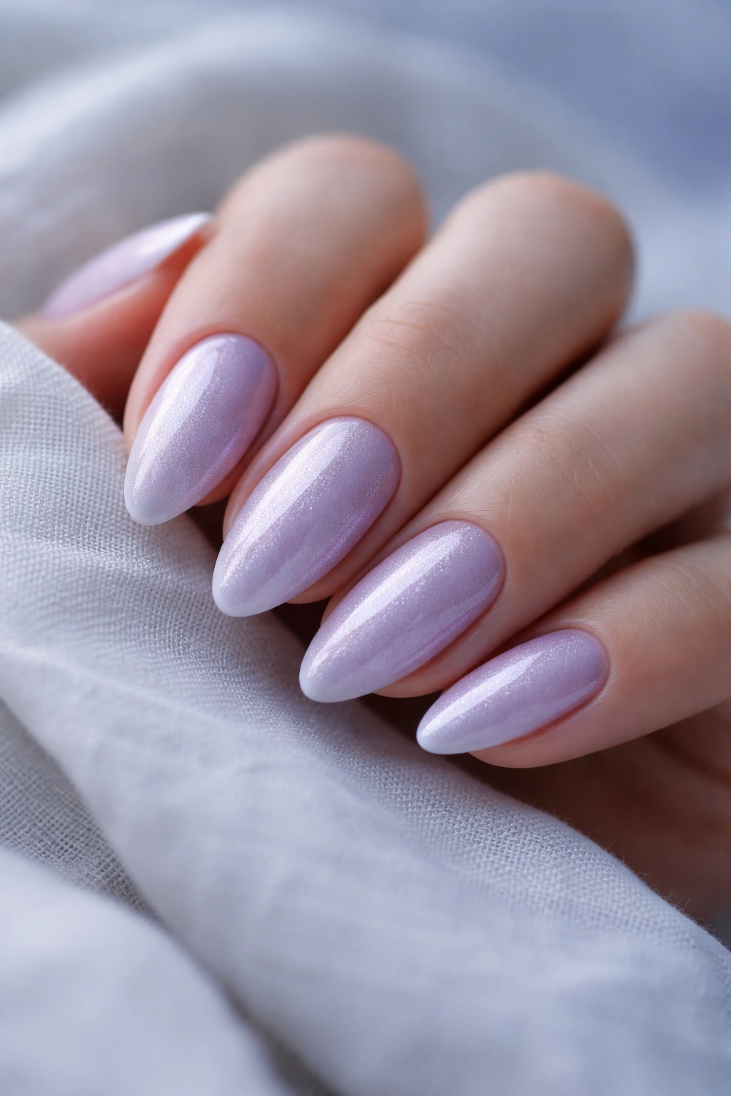 Lavender shimmer almond nails with fine shimmer