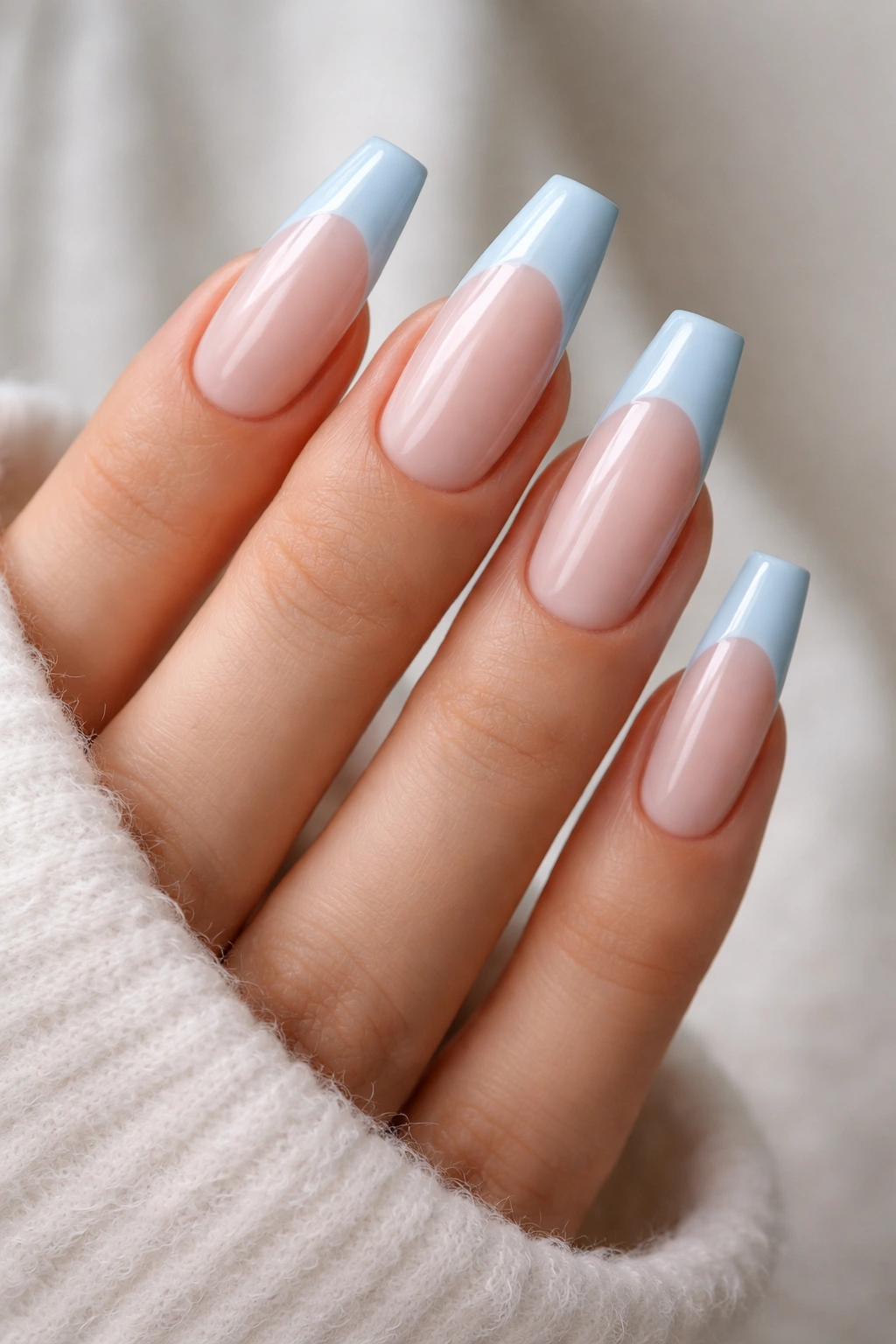 Close-up of coffin nails with pale blue tips and crisp line