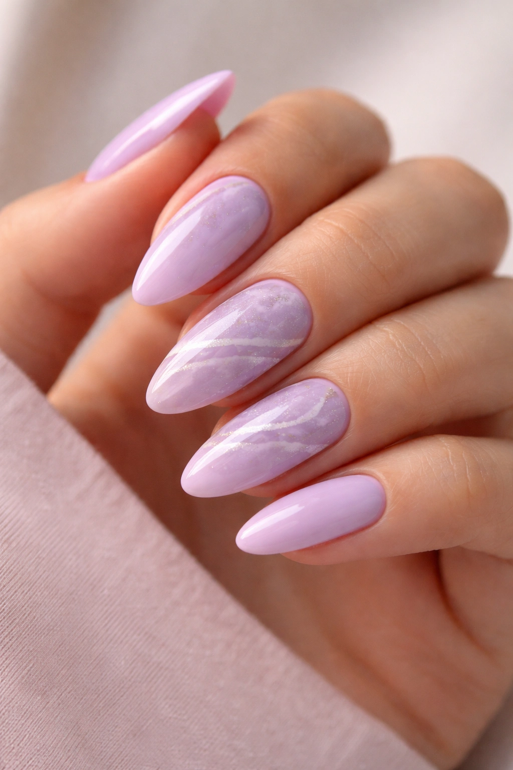 Lilac marble almond nails with diagonal white veins