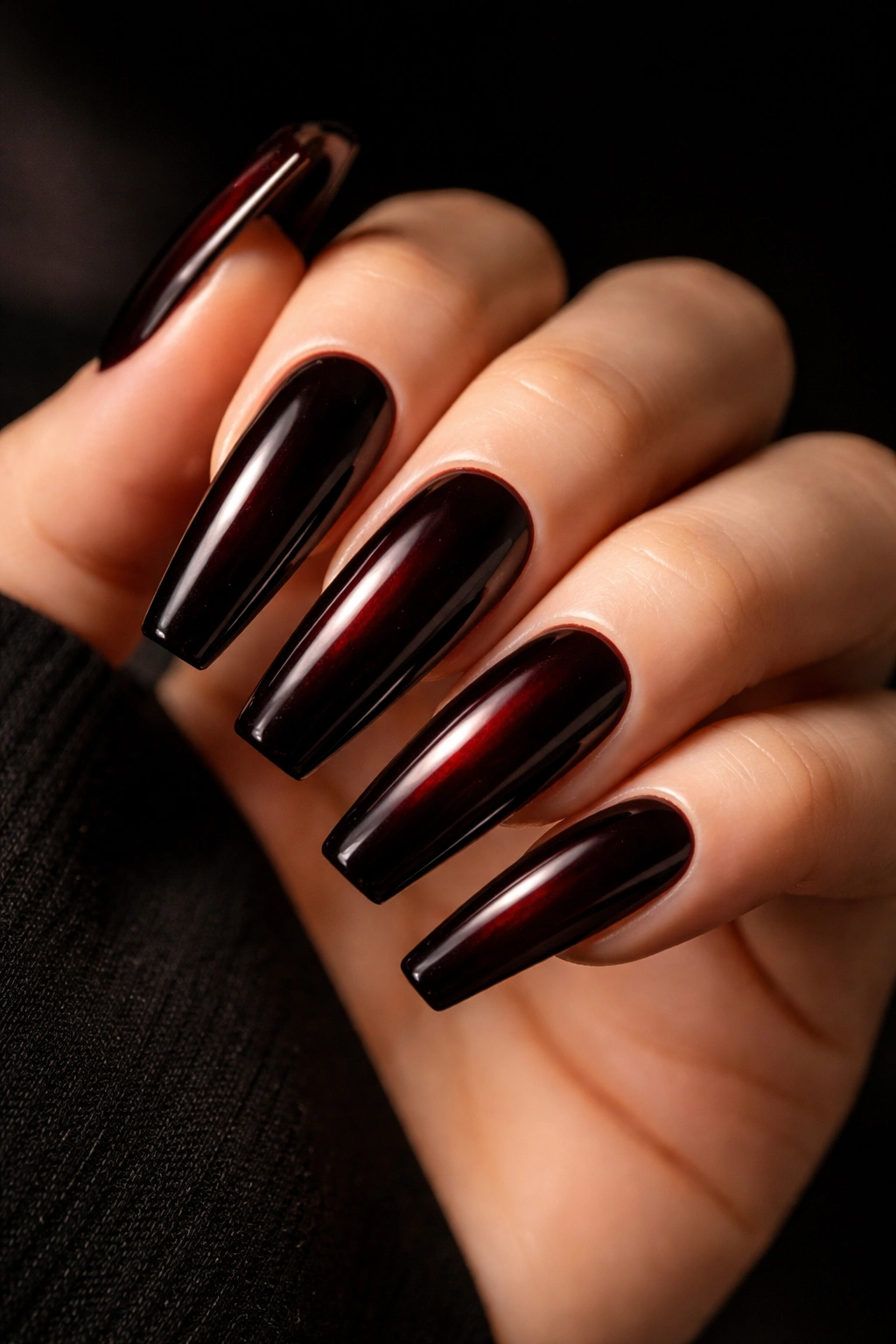 Long coffin nails in mahogany espresso red near-black in shadow