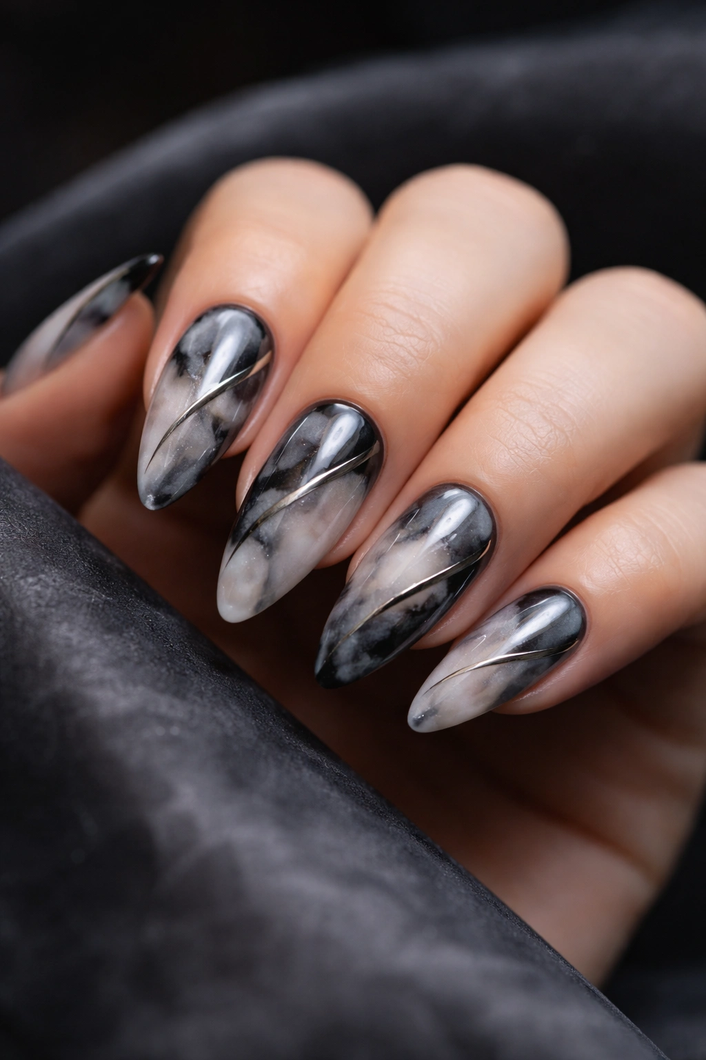 Almond nails with marble gray smoke and chrome accents