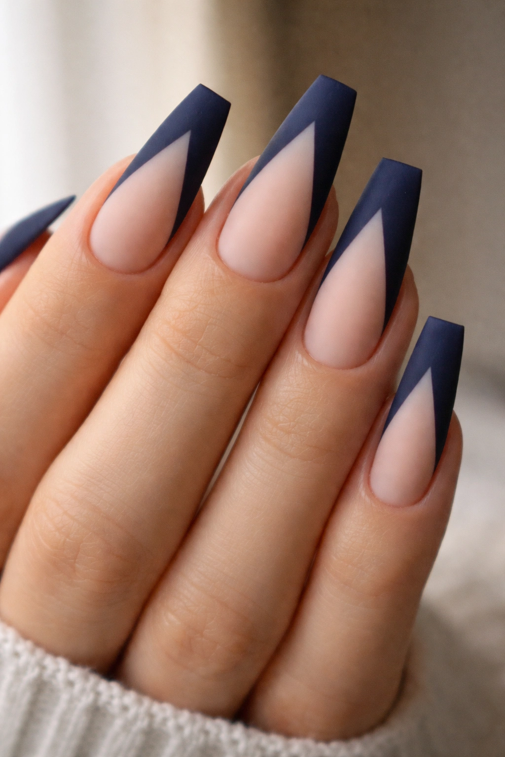 Coffin nails with matte navy V-French tips and sharp sidewalls