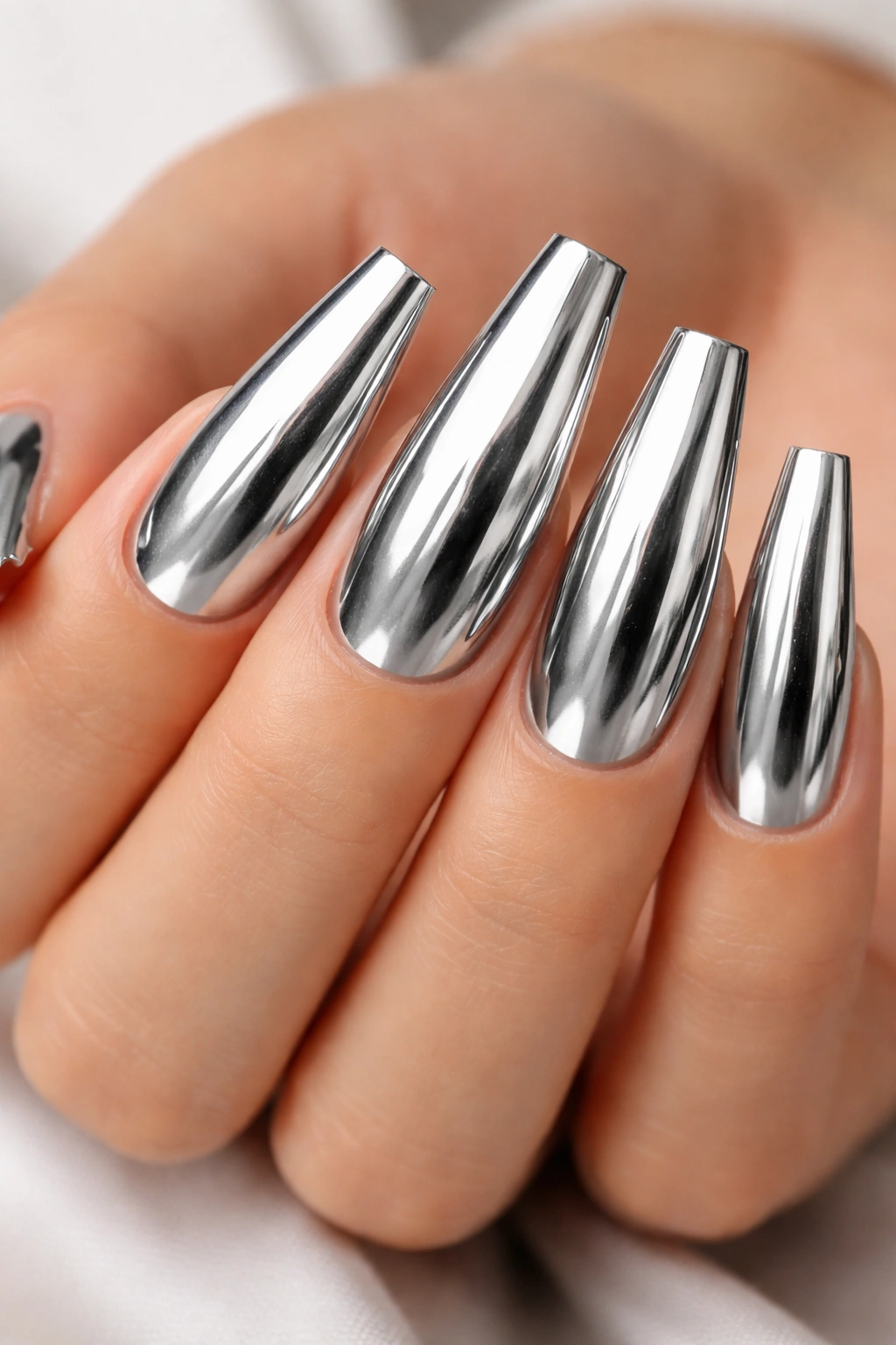 Mirror silver coffin nails with crisp sidewalls reflecting light