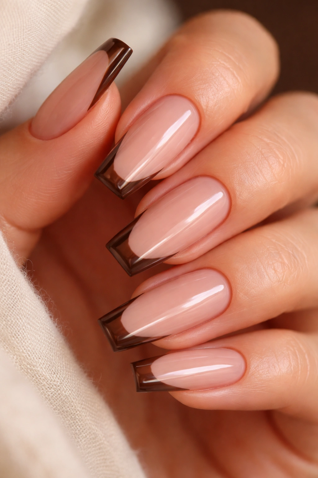 Coffin nails with sheer mocha base and thin mocha tip