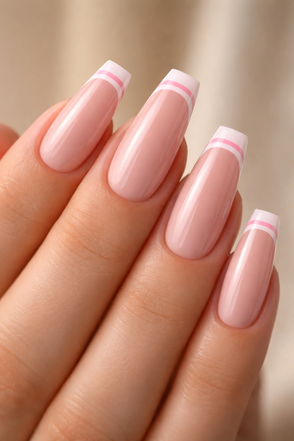Coffin nails with two fine pink lines at the tip
