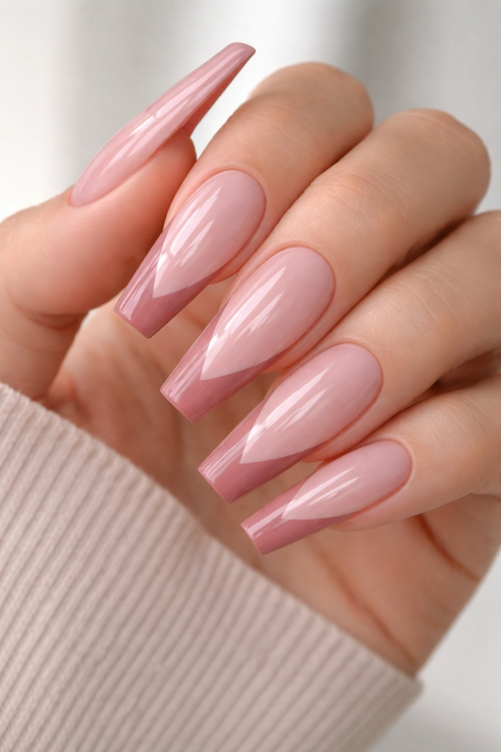 Long coffin nails with dusty rose V-shaped French tip