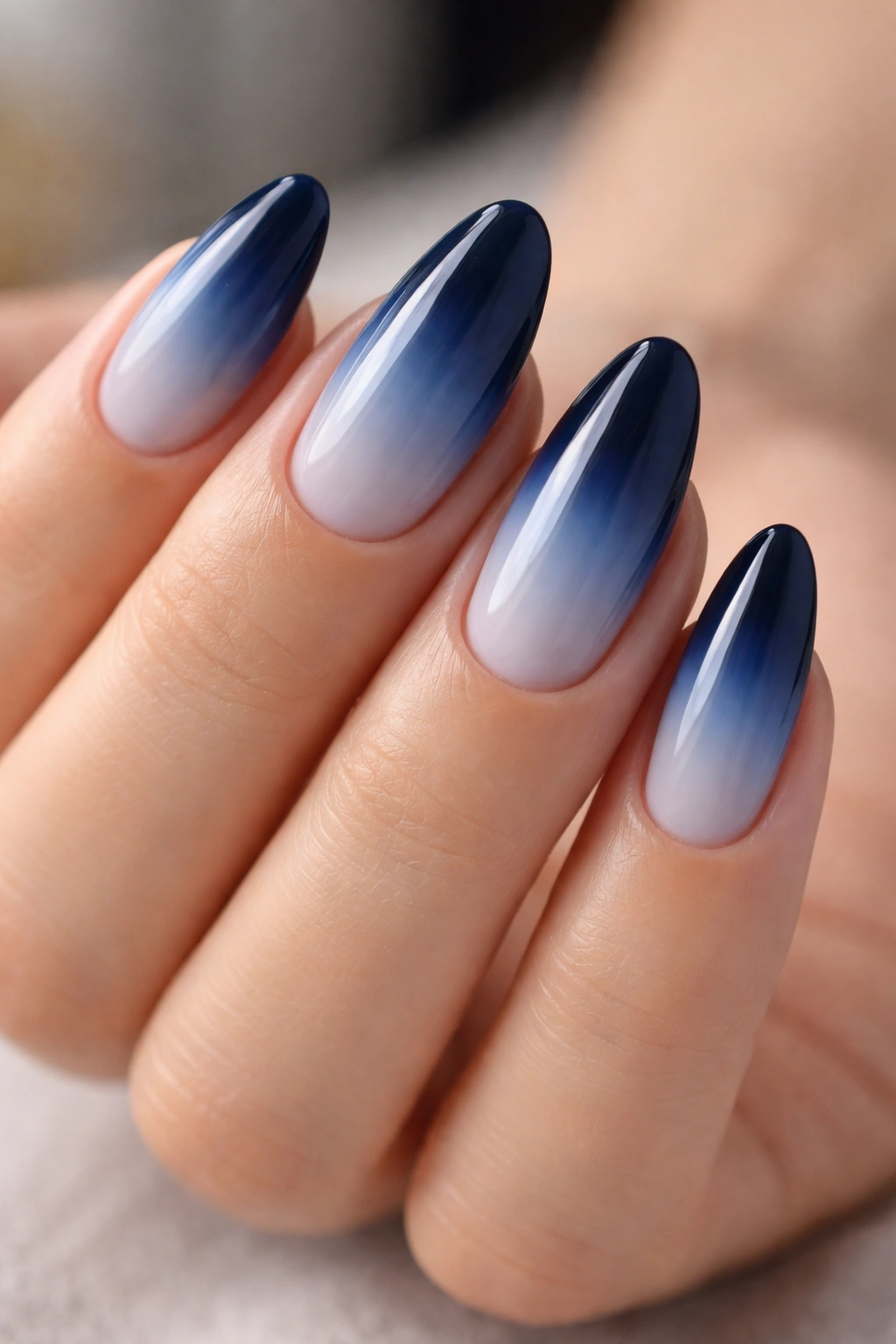 Almond nails with navy blue ombré fade