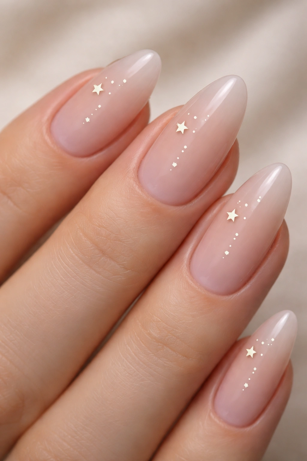 Negative-space almond nails with cuticle stars