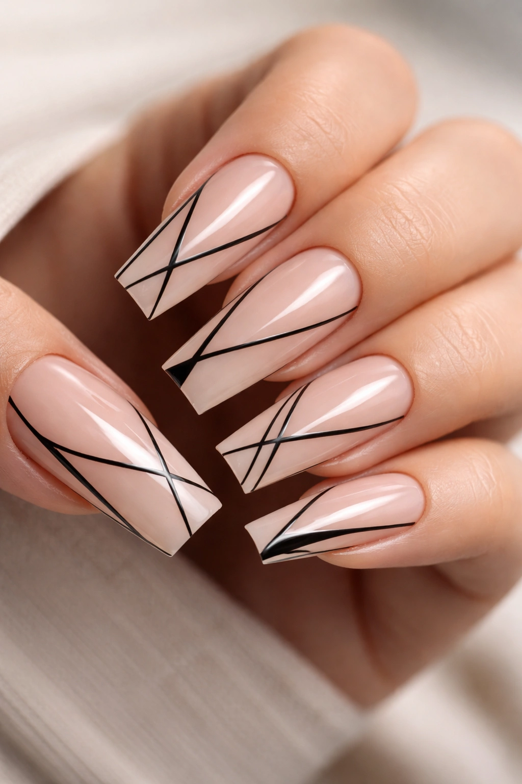 Nude base coffin nails with fine black linework