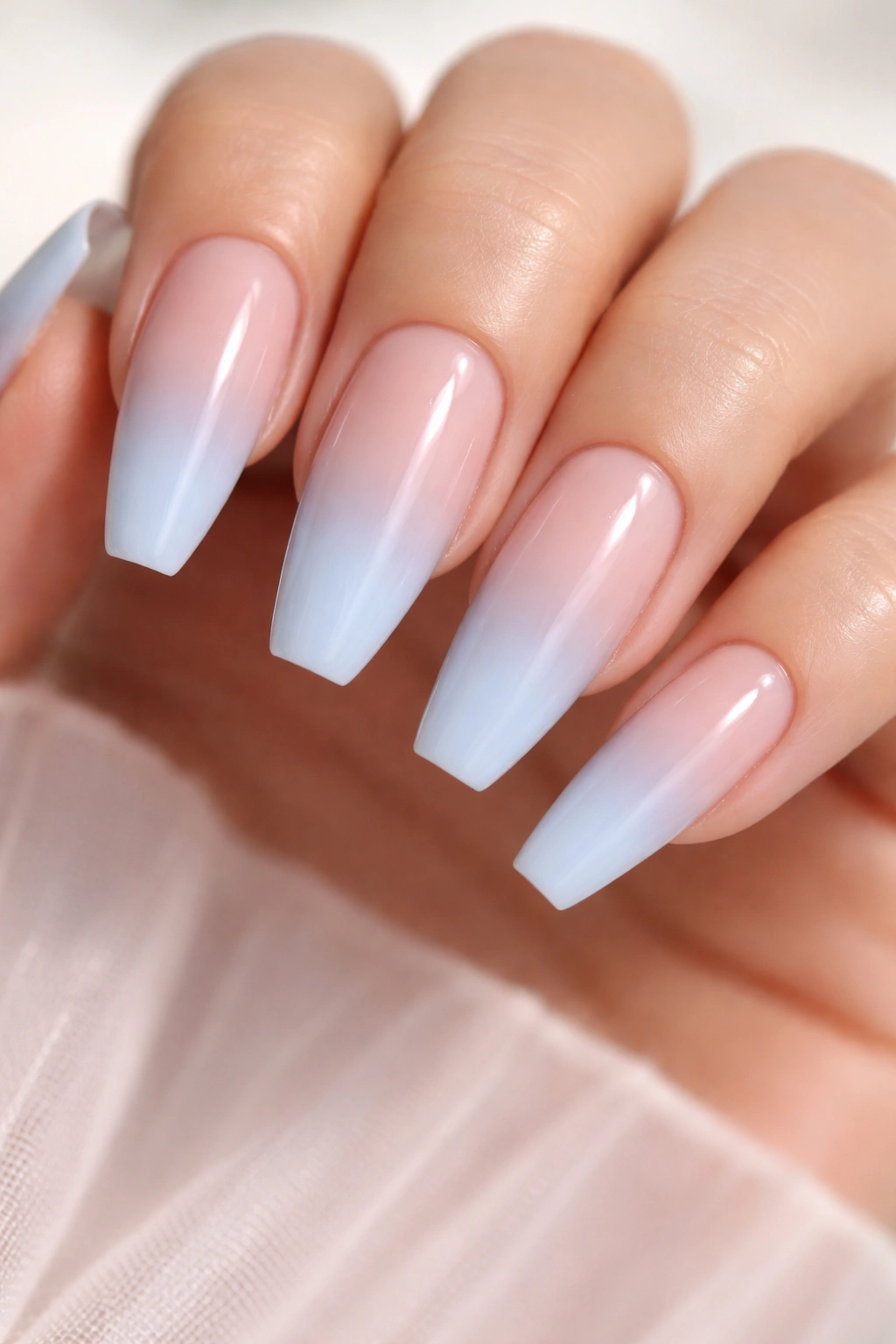 Nude to blue ombre nails on ballerina shape