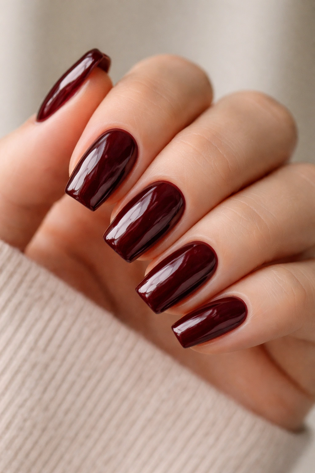 Short oxblood coffin nails with high-gloss finish