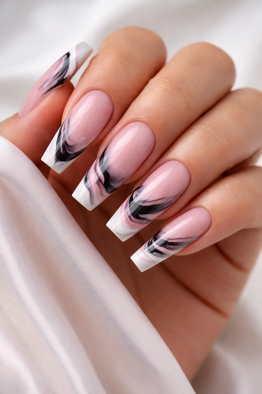 Coffin nails with pink translucent base and black-white marble swirls on tips