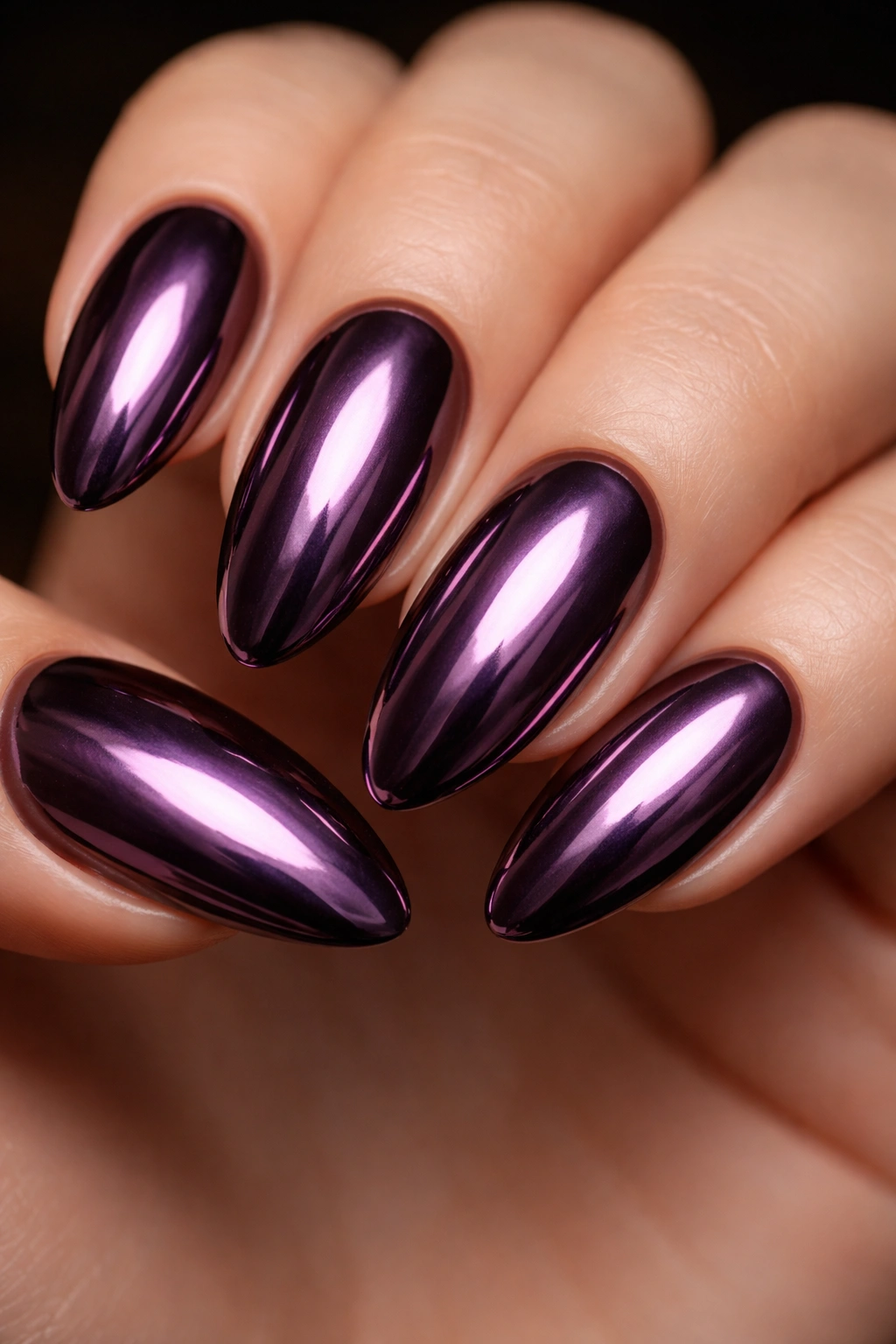 Almond nails with deep plum chrome mirror finish.