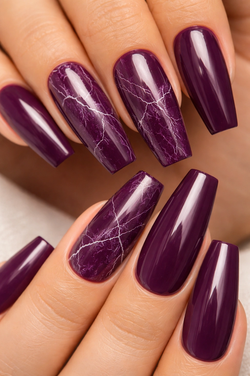 Plum marble nails with fine white veins
