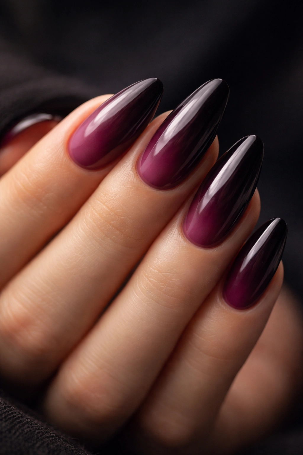 Plum to black cherry gradient on almond nails