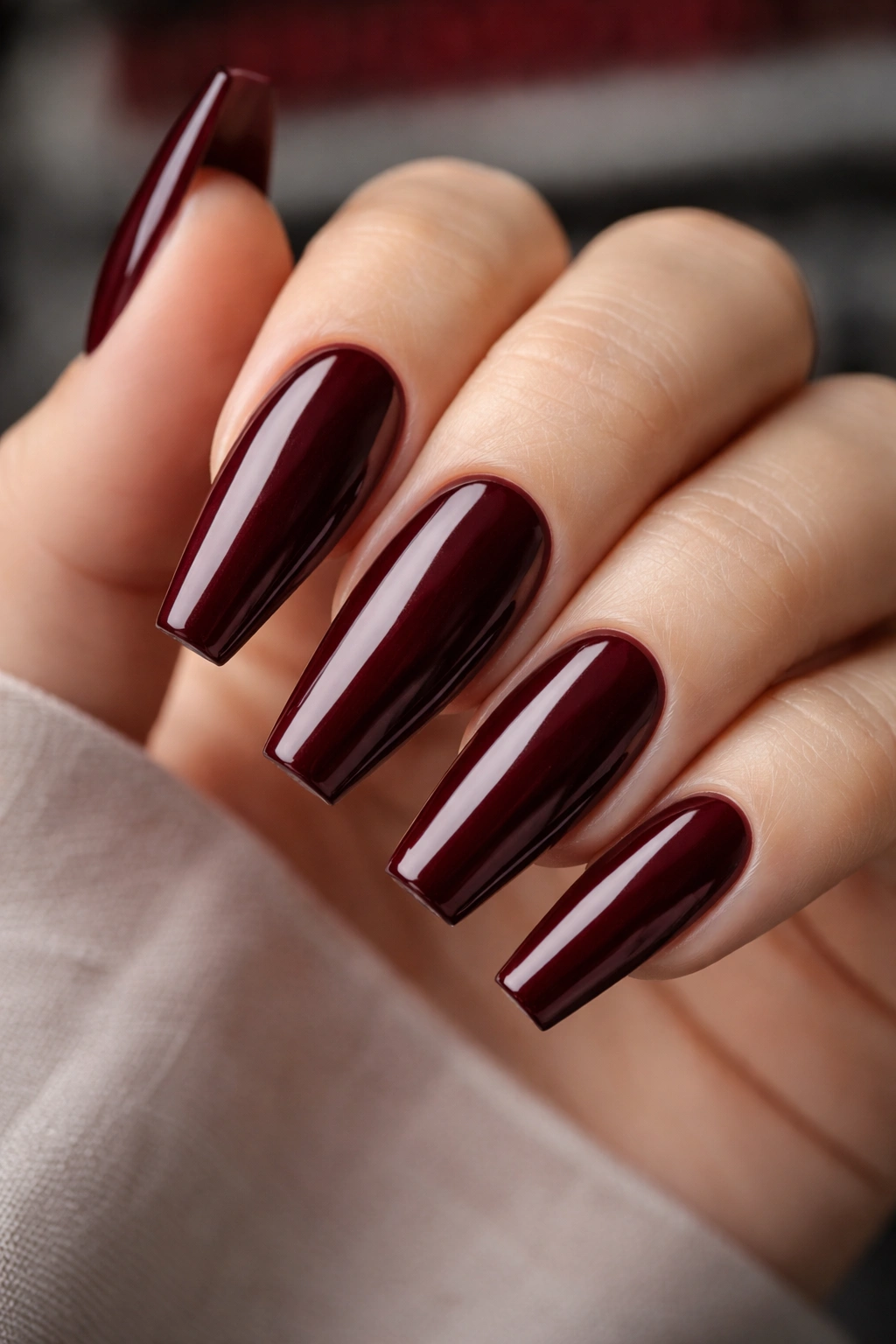 Sharp, well-shaped dark red coffin nails with crisp edges