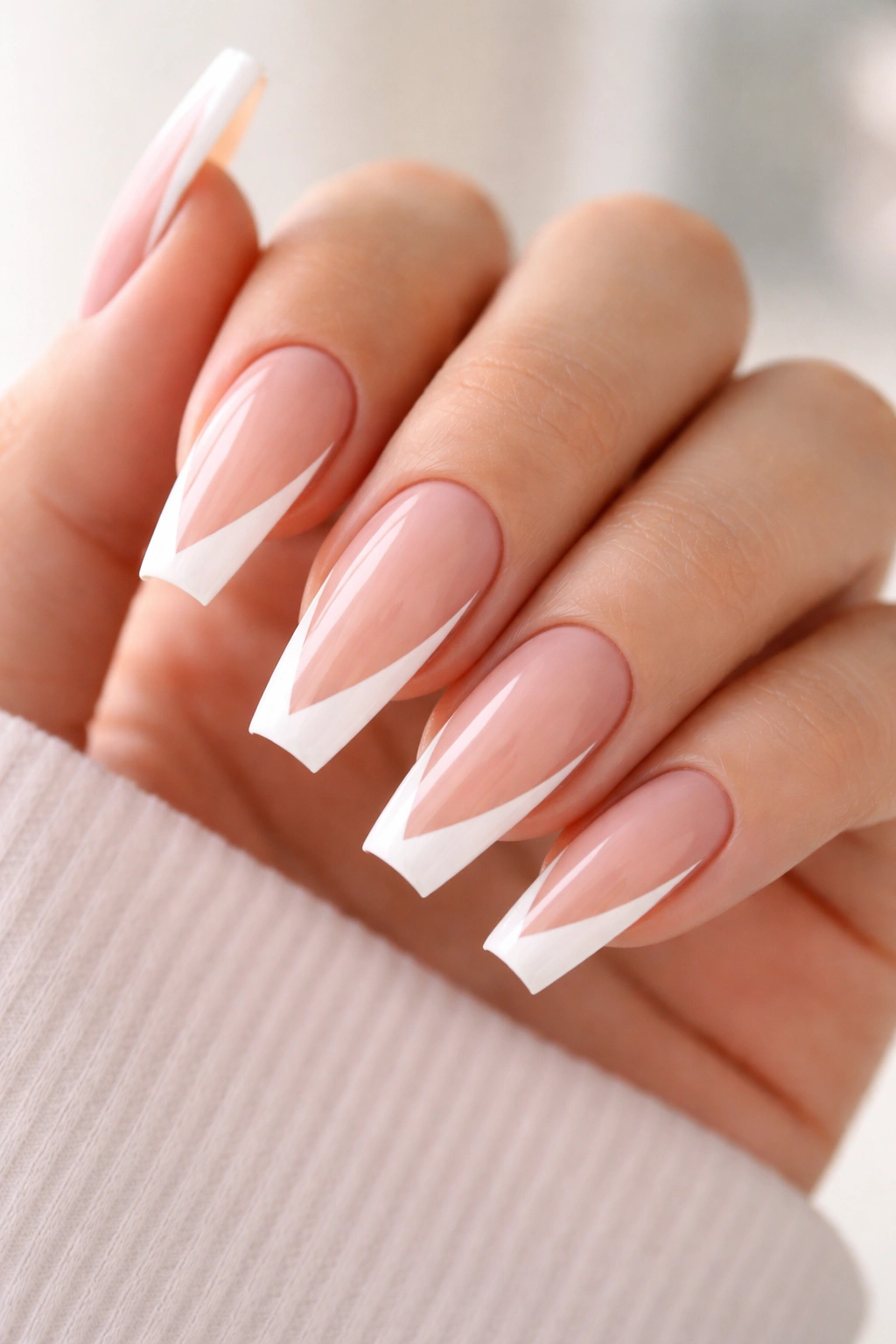 Close-up of coffin nails with a thin diagonal side French tip