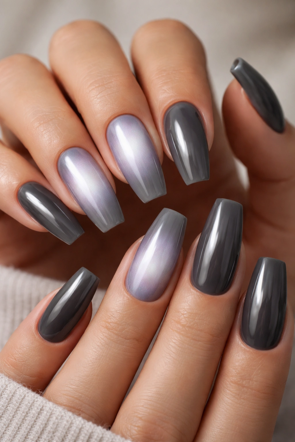 Smoke gray coffin nails with a centered soft aura on select nails