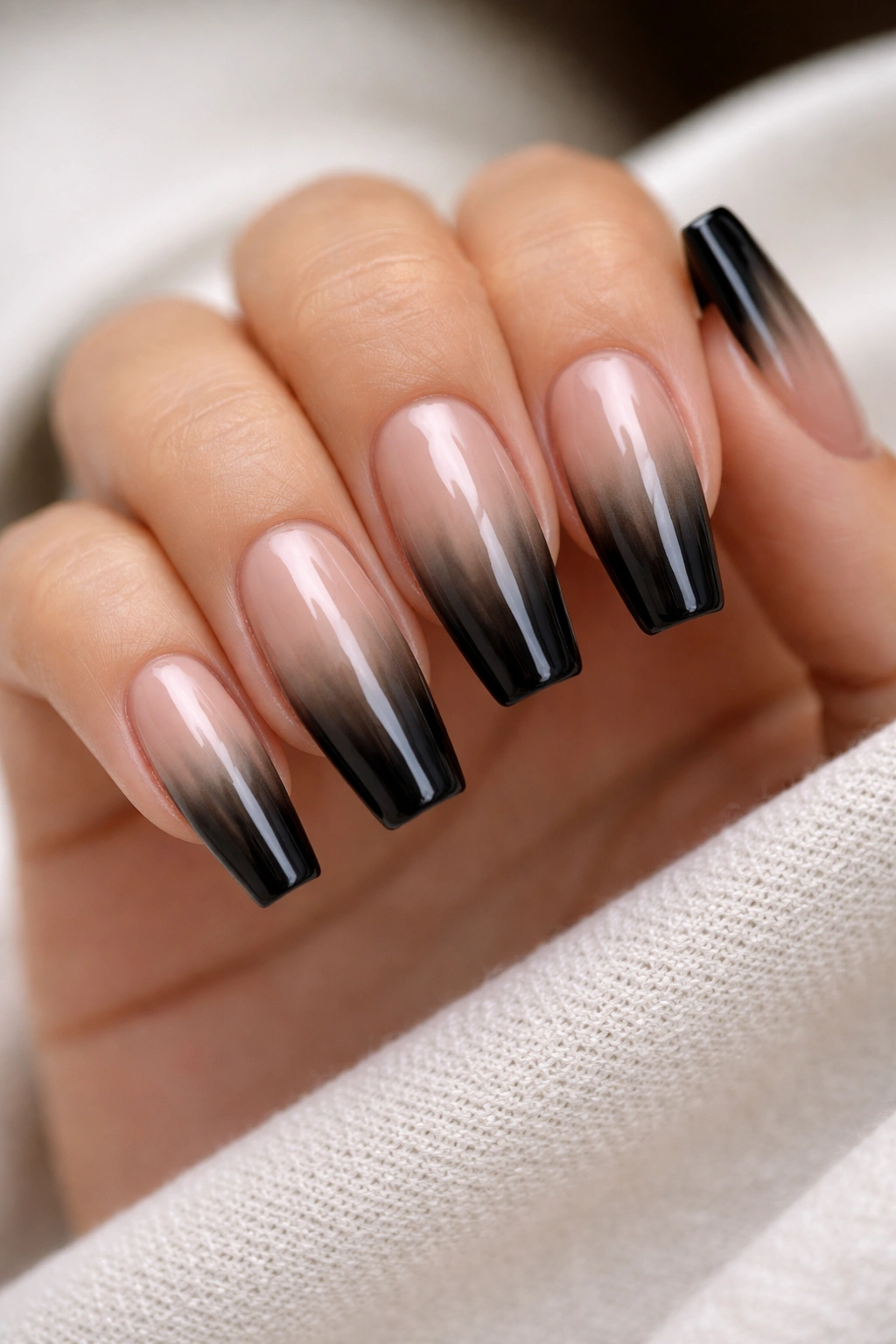 Smoky black ombré coffin nails with faded ends