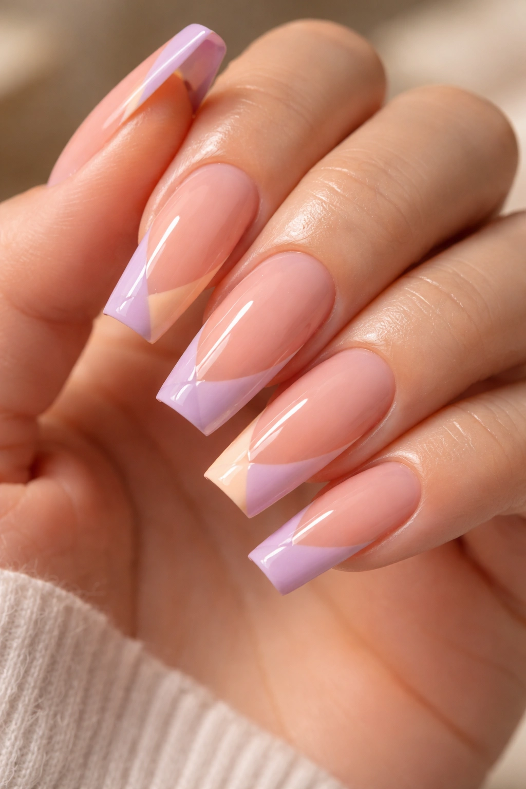Coffin nails with diagonal peach and lilac tips