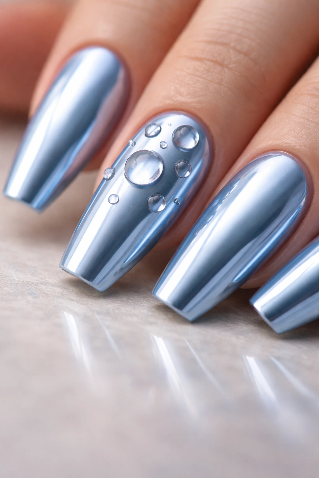 3D water-drop effects on light blue chrome coffin nails