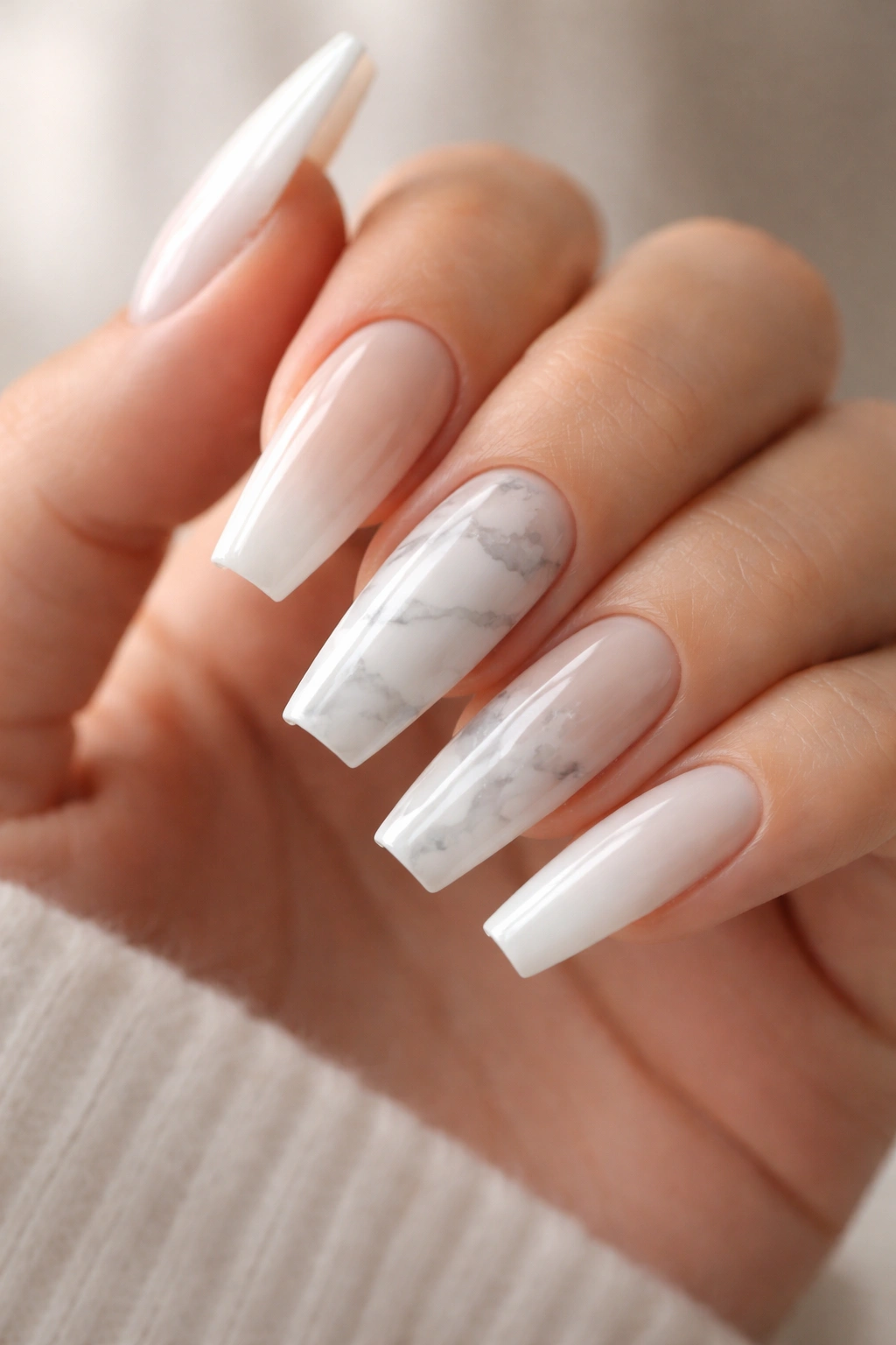 Coffin nails with white marble on nude base and gray veining